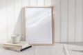 Empty Wooden Frame Mockup On Beige Linen Tablecloth Background. White Wooden Wall Paneling Background. Artistic Still