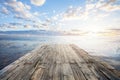 Empty wooden jetty at sunset, looking out over water Royalty Free Stock Photo