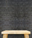 Empty wooden modern table on brick tiles wall,Mock up for display of product Royalty Free Stock Photo