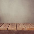 Empty wooden old table over grey grunge background Royalty Free Stock Photo