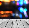 Empty Wooden Perspective Platform with Sparkling Abstract Rainbow Blur Bokeh used as Template to Mock up for Display Product Royalty Free Stock Photo