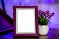 Empty wooden photo frame mock up in purple,violet cinematic scene Royalty Free Stock Photo