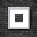 Empty Wooden Photo Frame. Vector Realistic white wood picture frame mockup template with shadow on grunge black brick Royalty Free Stock Photo