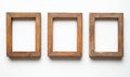 Empty wooden photo frames arranged in a row on white background Royalty Free Stock Photo