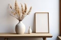 Empty Wooden Picture Frame. Framework. Vase with pampas grass.