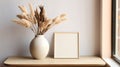 Empty Wooden Picture Frame. Framework. Vase with pampas grass.