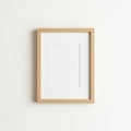 Empty Wooden Picture Frame with White Matting on a White Wall photo image Royalty Free Stock Photo