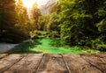 Empty wooden pier or table over mountain river Royalty Free Stock Photo