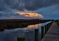 Fishing pier and wetlands at at dusk Royalty Free Stock Photo