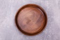 A wooden plate on the table Royalty Free Stock Photo