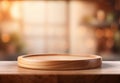 Empty wooden round desk in the modern kitchen interior. Kitchen table podium on blurred background. Empty product display Royalty Free Stock Photo