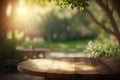 Empty wooden round table for product display with blurred garden background. Ai generative Royalty Free Stock Photo