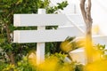Empty wooden sign with two arrows in the garden Royalty Free Stock Photo