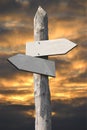Empty wooden signpost with two arrows Royalty Free Stock Photo