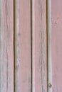 Empty wooden surface. Background of multi-colored horizontal and vertical boards. Old vintage wooden door. Empty space for text or Royalty Free Stock Photo