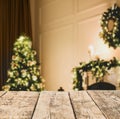 Empty wooden surface and blurred view of Christmas tree in room, space for text. Interior design Royalty Free Stock Photo