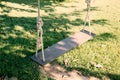 Empty Wooden Swings in the park vintage filter style Royalty Free Stock Photo