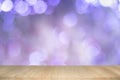 Empty wooden table on abstract background with colorful bokeh Royalty Free Stock Photo