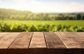 Empty wooden table on the background of farm fields with harvest. Ready for product display montages.Generative AI