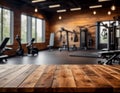 Empty wooden table with beautiful fitness background
