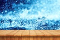 Empty wooden table and blue water wall background Royalty Free Stock Photo