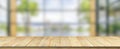 Empty wooden table and blur glass wall background window room.
