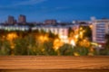 Empty wooden table with blurred background of night city. Can be used for display or montage product Royalty Free Stock Photo