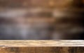 Empty wooden table and blurred background of wooden wall Royalty Free Stock Photo