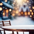 Empty wooden table, blurred Christmas decorated house exterior Royalty Free Stock Photo