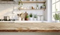 Empty wooden table with a blurred kitchen bench in the background, minimalist interior concept Royalty Free Stock Photo