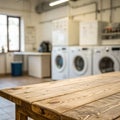 Empty Wooden Table in Blurred Laundry Room with Washing Machine Royalty Free Stock Photo