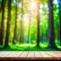 Empty wooden table, blurred summer forest background with copy space
