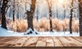 Empty wooden table, blurred winter background with copy space
