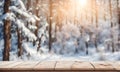 Empty wooden table, blurred winter background with copy space