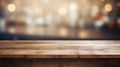 Empty wooden table with bokeh image of kitchen bench interior Royalty Free Stock Photo