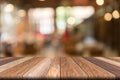 Empty wooden table of brown in front Warm orange color of bokeh on wooden Royalty Free Stock Photo