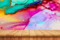 Empty wooden table and colourfull wall background Royalty Free Stock Photo