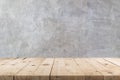 Empty wooden table and concrete wall texture and background with copy space, display montage for product Royalty Free Stock Photo