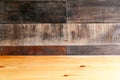 Empty wooden table with dark wood wall, can be used as a background.