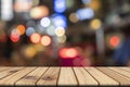 Empty wooden table in front abstract blurred bokeh colorful background Royalty Free Stock Photo