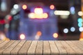 Empty wooden table in front abstract blurred bokeh colorful background Royalty Free Stock Photo