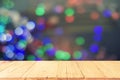Empty wooden table in front of abstract bokeh background . can b