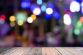 Empty wooden table on front blurred colorful bokeh background Royalty Free Stock Photo