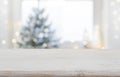 Empty wooden table in front of blurred winter festive background Royalty Free Stock Photo