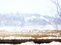 Empty wooden table in front of dreamy and magical winter landscape background. For product display montage. Royalty Free Stock Photo