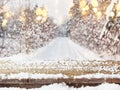 Empty wooden table in front of dreamy and magical winter landscape background. For product display montage. Royalty Free Stock Photo