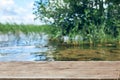 Empty wooden table with landscape background. Lake with mist and cloud. Focus on wooden desk table Royalty Free Stock Photo