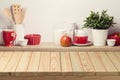Empty wooden table over blurred kitchen shelf background Royalty Free Stock Photo