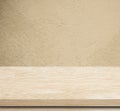 Empty wooden table over grunge cement wall. Royalty Free Stock Photo