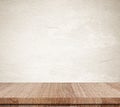 Empty wooden table over grunge cement wall background, product d Royalty Free Stock Photo